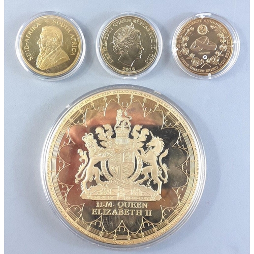 91 - A collection of gold plated coins. Interesting lot, looks like a million dollars!  Includes a huge 1... 