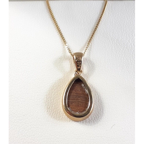 1 - A lovely 375 stamped teardrop shaped opal pendant (1cm long) on a 375 stamped chain approx 42cm long... 