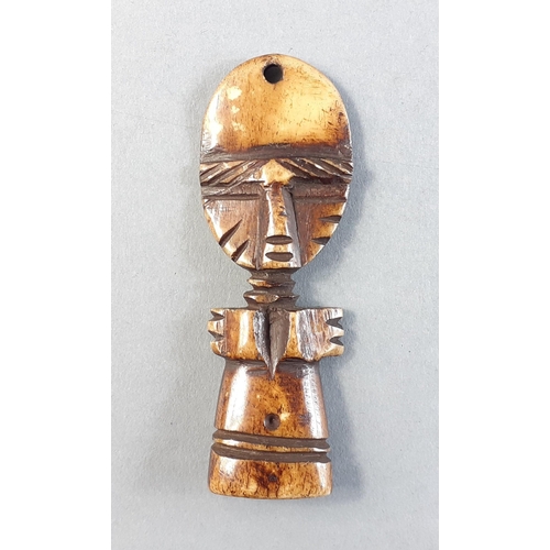 40 - A SENEGAL tribal polished hardwood fertility pendant in lovely condition. 6cm approx. Purchased by t... 