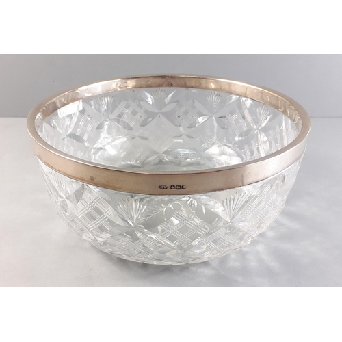 45 - A stunning large crystal bowl with silver hallmarked collar.  Hallmarked Sheffield 1924 by Henry Wig... 