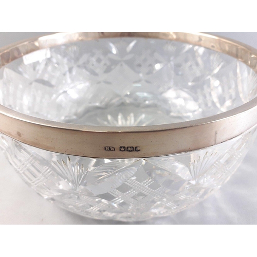 45 - A stunning large crystal bowl with silver hallmarked collar.  Hallmarked Sheffield 1924 by Henry Wig... 