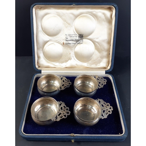 46 - A cased set of four sterling silver salts / condiment dishes by The Goldsmiths & Silversmiths Co... 