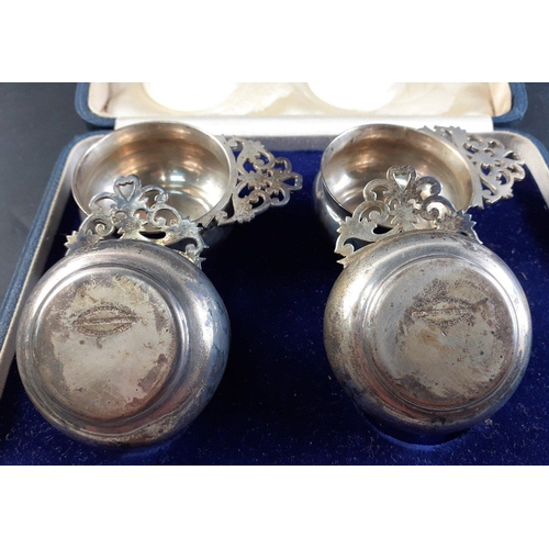 46 - A cased set of four sterling silver salts / condiment dishes by The Goldsmiths & Silversmiths Co... 