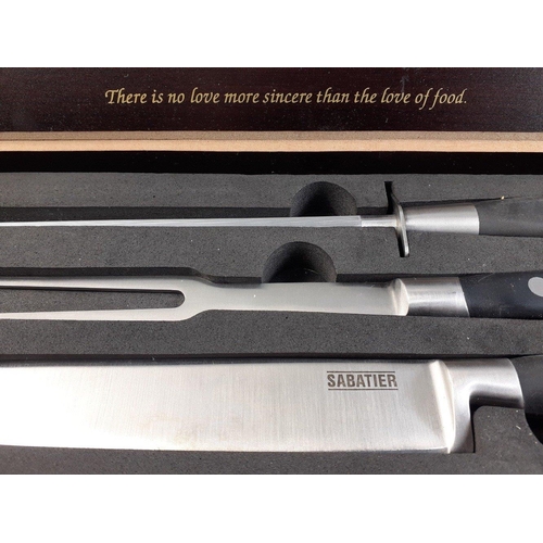 49 - A super quality SABATIER three piece carving set in box, appears unused.#53