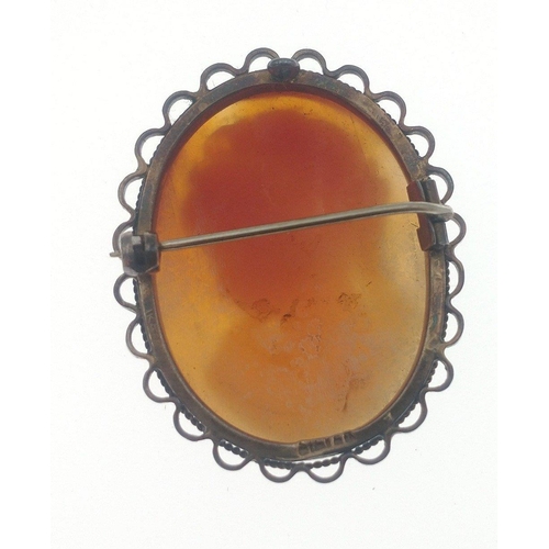 27 - An attractive cameo brooch length 3.5cm approx, metal frame with indistinct marks#27