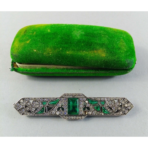 28 - A gorgeous Art Deco bar brooch set with both clear and green stones.  Measures 7.5cm approx. and has... 