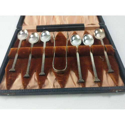 29 - A boxed set of 6 coffee spoons with sugar tongs each 11cm long with column finials.  Nice piece#29... 