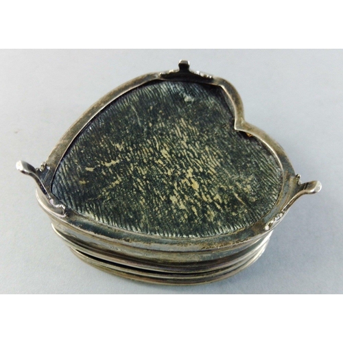 31 - A small silver hallmarked lined heart shaped trinket box.  Indistinct hallmark, 6cm length.  Gross w... 