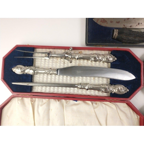 36 - A cased antique silver collared WALKER & HALL carving set Sheffield 1920. Horn handled with stee... 