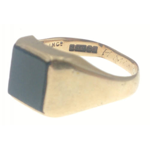 5 - A 375 stamped yellow gold signet ring with a square black stone ring size Q weight gross 5.47g appro... 