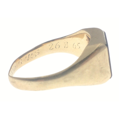 5 - A 375 stamped yellow gold signet ring with a square black stone ring size Q weight gross 5.47g appro... 