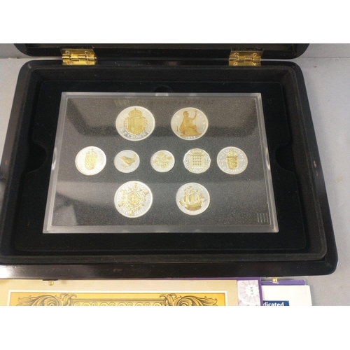 58 - Four boxed sets of commemorative coins to include boxed set of 12 plated coins with gilt Pre -Decima... 