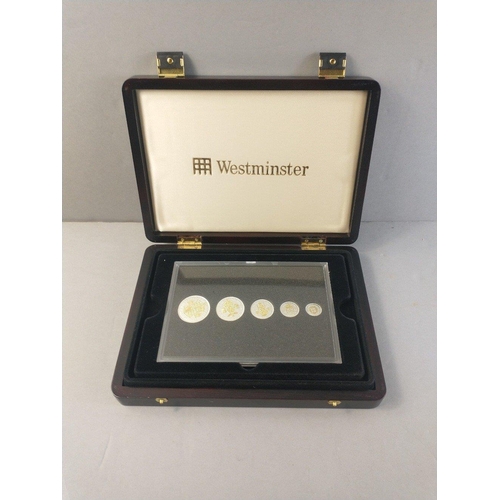 58 - Four boxed sets of commemorative coins to include boxed set of 12 plated coins with gilt Pre -Decima... 