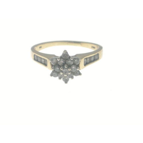 6 - A 10k stamped yellow gold diamonds (tested) set dress ring (size Q) in floral form with diamonds on ... 