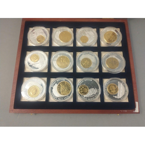 60 - Two cases of plated coins in cases to include pre-decimalisation coins and coins of Britannia.#60... 