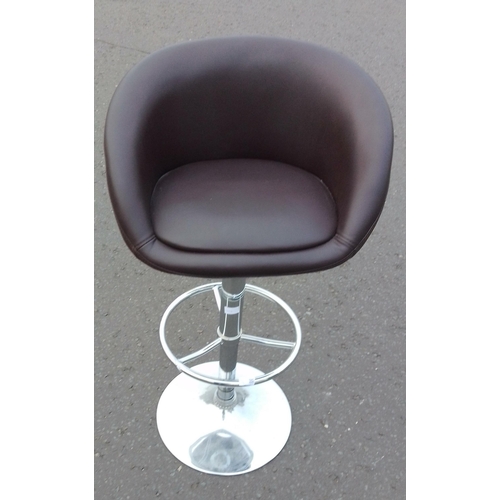 107 - A brown leather Breakfast/Bar stool with adjustable chrome base in good condition standing 80cm tall... 