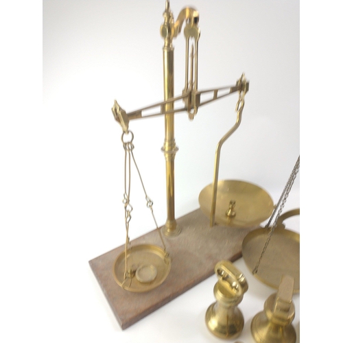 122 - Two pairs of large brass AVERY balance scales includes weights.#30