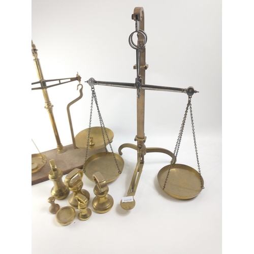 122 - Two pairs of large brass AVERY balance scales includes weights.#30