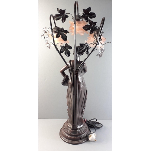 161 - A large and impressive spelter classical lady table lamp with floral glass shades.  One detached lea... 