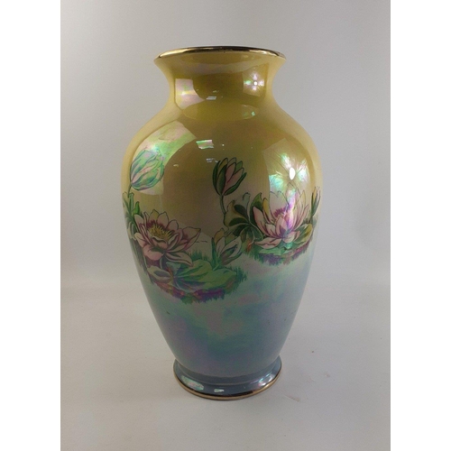 176 - A stunning Royal Winton vase with water lily design on lustre ground.  Stands approx 36cm#58