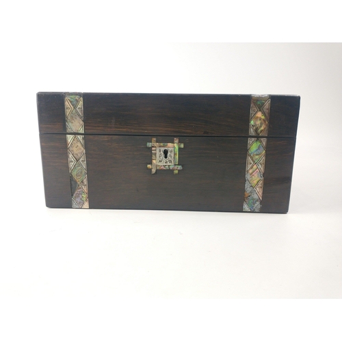 67 - A large dark wood jewellery box (30x22x14cm approx) with a mother of pearl decorative band (several ... 