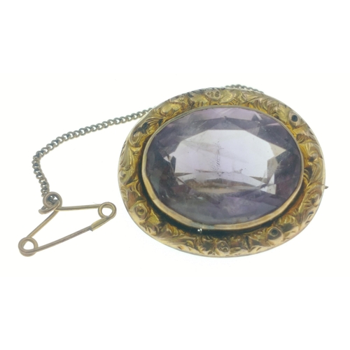 9 - A VICTORIAN 9ct stamped oval brooch with a large oval centred AMAZING AMETHYST - gross weight 6.72g ... 