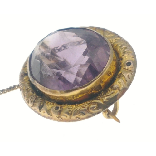 9 - A VICTORIAN 9ct stamped oval brooch with a large oval centred AMAZING AMETHYST - gross weight 6.72g ... 