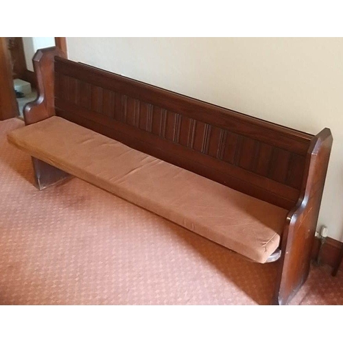 96 - An old church pew measuring L185 x D46 x H94cm  approx.  In good condition, comes with padded seat, ... 