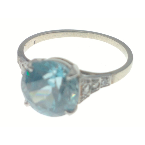 104 - A lovely turquoise (8mm) ring on unmarked white metal band, size N, gross weight 2.65g approx.  1980... 