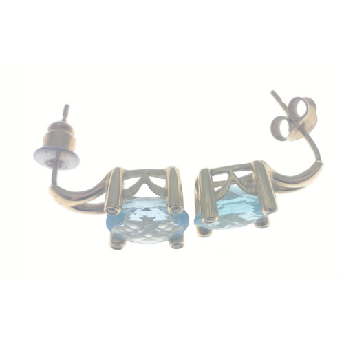 112 - A14K stamped diamond (tested) and aquamarine earrings 8mm in length, gross weight 4g approx#113