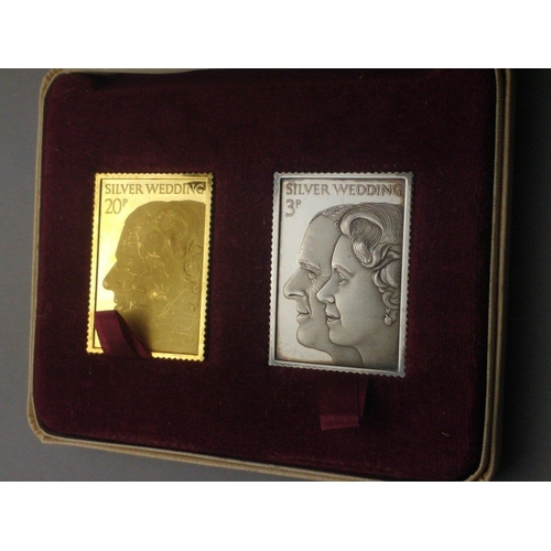 117 - The Royal Silver Wedding anniversary commemorative stamp replica box set containing a 22ct gold 20p ... 