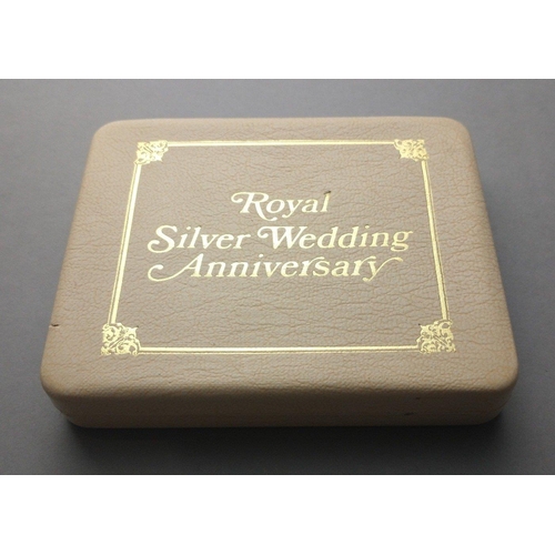 117 - The Royal Silver Wedding anniversary commemorative stamp replica box set containing a 22ct gold 20p ... 