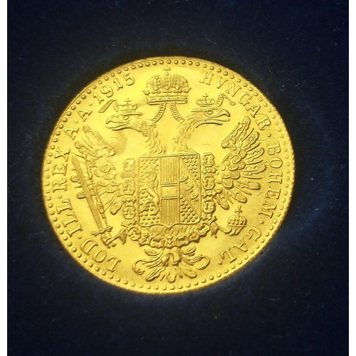 121 - A 1915 Franz Joseph 10 franc gold coin, weight 3.5g approx#125