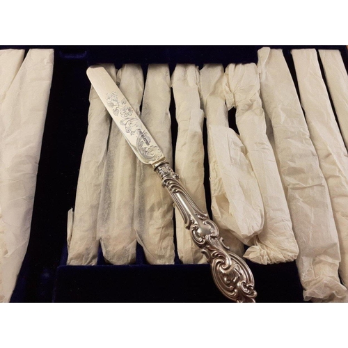 142 - A stunning canteen of Victorian solid silver cutlery. Twelve knives and twelve forks H.M. Sheffield ... 