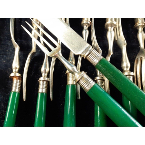 143 - Canteen box containing twelve butter knives and forks with sterling silver hallmarked collars. Does ... 