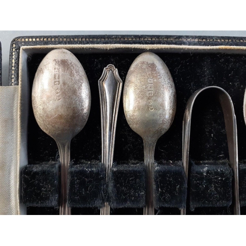 151 - A boxed set of silver hallmarked six coffee spoons with tongs, Birmingham year indistinct, weight 55... 