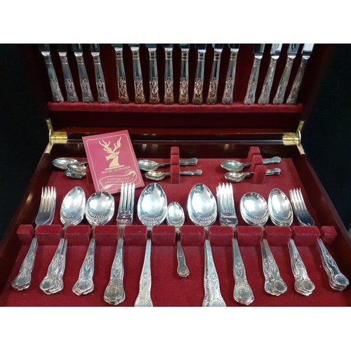 177 - A lovely HOUSE OF FRASER SHEFFIELD made red leather topped canteen of fine cutlery on legs, 8 place ... 