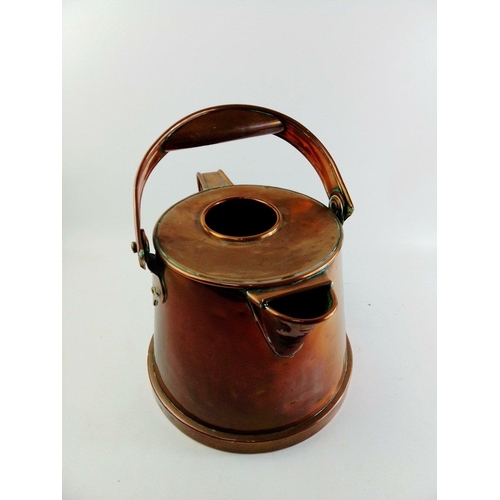 195 - A substantial copper watering can stands 22cm high approx#201