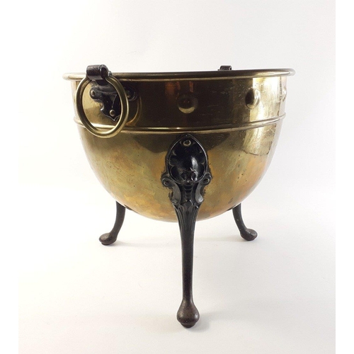 198 - A rather lovely twin-handled jardiniere in brass with cast iron feet D36 x H33cm approx.  In overall... 