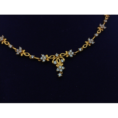 23 - Al-Haseena 22ct gold Middle Eastern necklace and a pair of earrings set.  Supplied with original pur... 