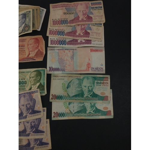 232 - A selection of Turkish lira banknotes of interest.  Some high denomination.  All with wear from circ... 