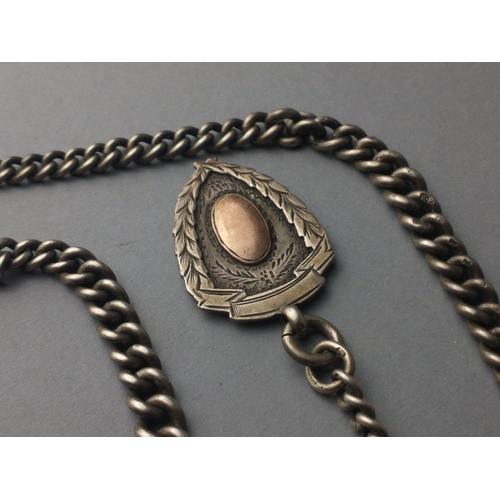 264 - A sterling silver Albert chain with a hallmarked vesta case and a fob.  Gross weight 63g approx#272... 