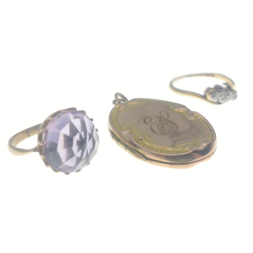 284 - A pendant stamped 9ct back & front, a ring 18ct plated, and an unmarked ring with a purple stone... 