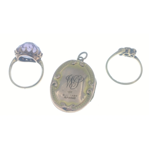 284 - A pendant stamped 9ct back & front, a ring 18ct plated, and an unmarked ring with a purple stone... 