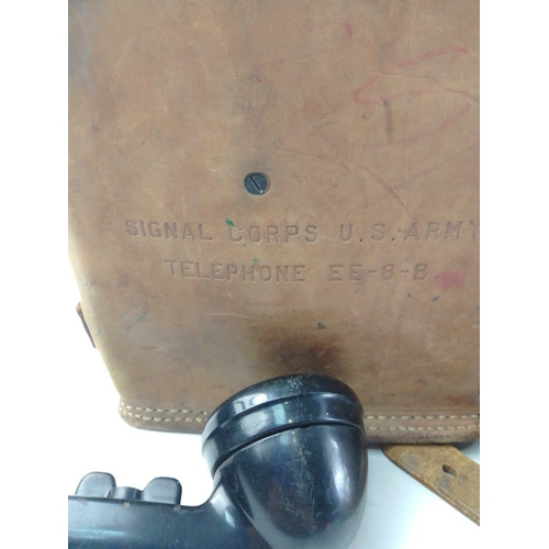 302 - Two US ARMY SIGNAL CORPS telephone EE-8-B in leather pouches with hand-sets.  Some writing to cases ... 