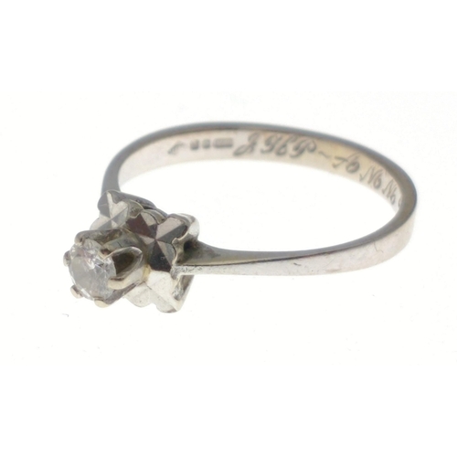 32 - A white gold 750 stamped ring set with a solitaire diamond.  Size M/N, gross weight 2.3g approx#32... 