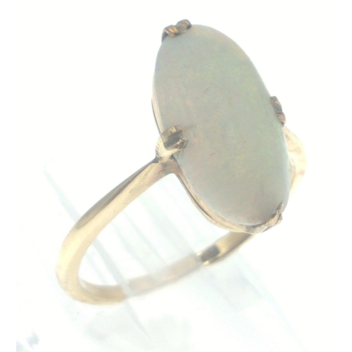 39 - A 9ct gold ring set with a lovely oval opal (15mm approx), size P, gross weight 2.55g approx.#39