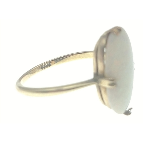 39 - A 9ct gold ring set with a lovely oval opal (15mm approx), size P, gross weight 2.55g approx.#39