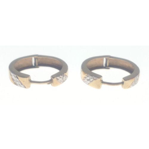 49 - A pair of small gold hoop earrings stamped 375.  Weigh 1.35g approx#49