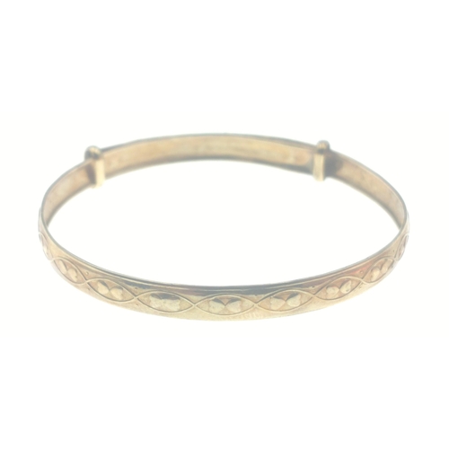 50 - A 375 stamped gold baby's bangle, weight 1.83g approx#50